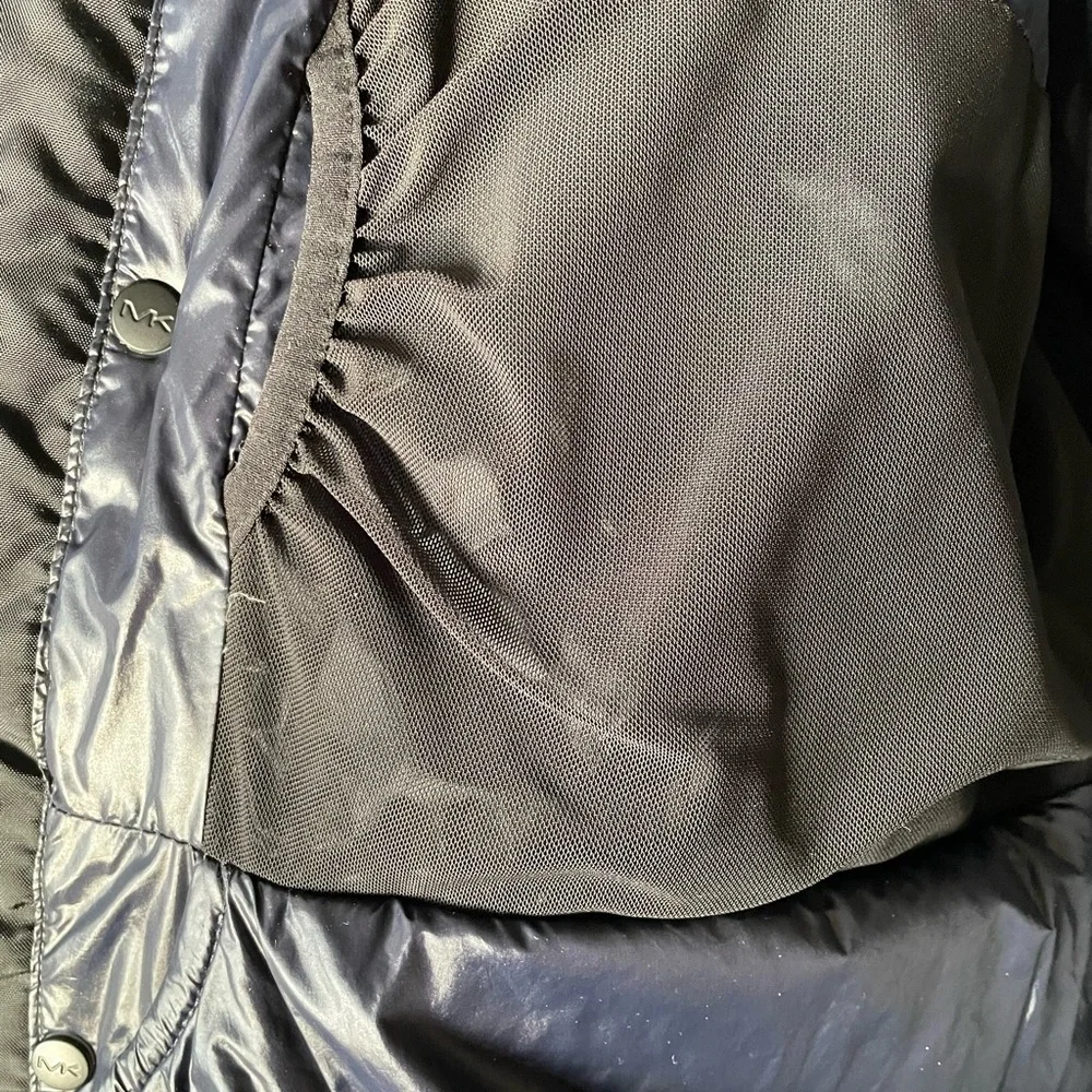 Michael Kors gray and black winter jacket.